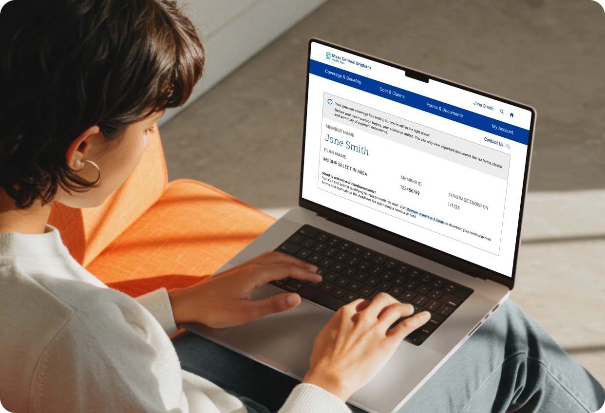 A member using the Mass General Brigham Health Plan portal on a laptop